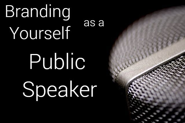 branding yourself as a public speaker written next to a mic